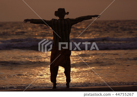 man on the beach in india, ocean, coast, vacation. rest on goa man on the beach in india, ocean, coast, vacation. rest on goa 44755267