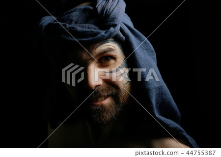 tattoo on the face, male portrait in the form of an assassin, cosplay, tattooed brutal man, guy with a tattooed face tattoo on the face, male portrait in the form of an assassin, cosplay, tattooed brutal man, guy with a tattooed face 44755387