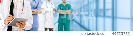 Doctor working in hospital with other doctors. 44755773