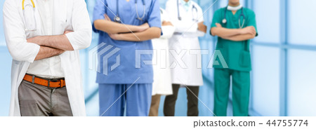Doctor working in hospital with other doctors. 44755774