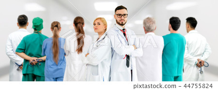Doctor working in hospital with other doctors. 44755824