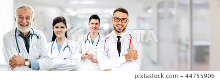 Doctor working in hospital with other doctors. Doctor working in hospital with other doctors. 44755906