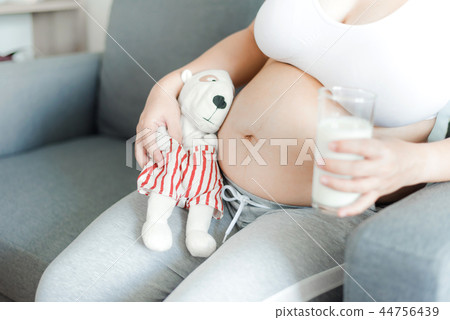 Asian pregnant woman with big belly. Relax at home 44756439