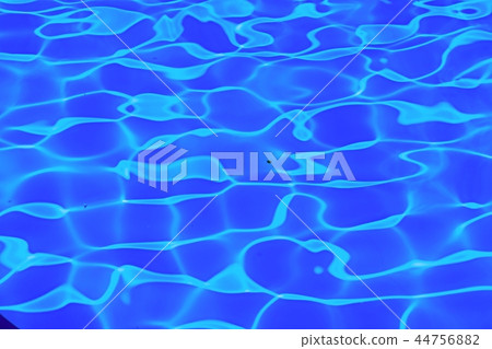 Scenic reflection on water surface in close up  44756882