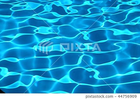 Scenic reflection on water surface in close up Scenic reflection on water surface in close up 44756909