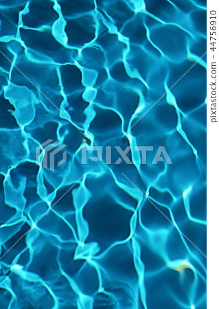 Scenic reflection on water surface in close up Scenic reflection on water surface in close up 44756910