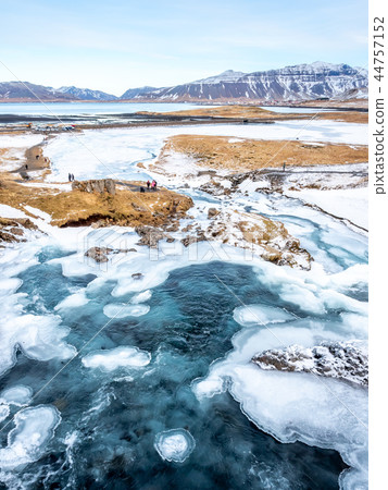 Kirkjufellfoss waterfall in winter, Iceland 44757152