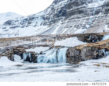 Kirkjufellfoss waterfall in winter, Iceland 44757274