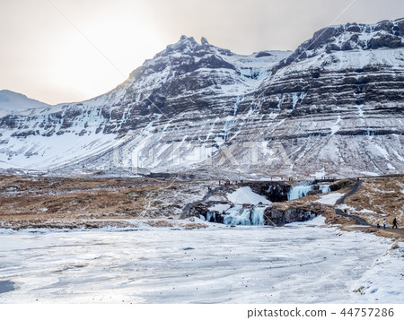 Kirkjufellfoss waterfall in winter, Iceland 44757286