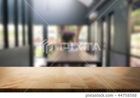 Selected focus empty brown wooden table and Coffee shop or resta Selected focus empty brown wooden table and Coffee shop or resta 44758588