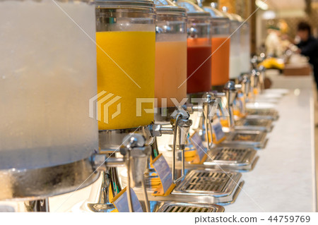 fruit juice in water cooler for breakfast  44759769