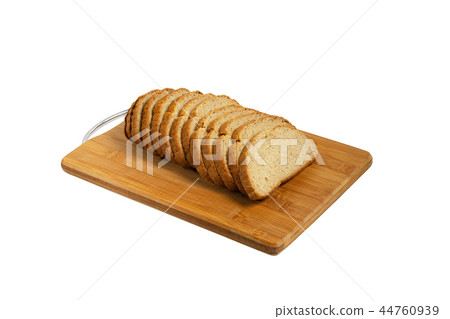 Sliced bread on a board. Sliced bread on a board. 44760939