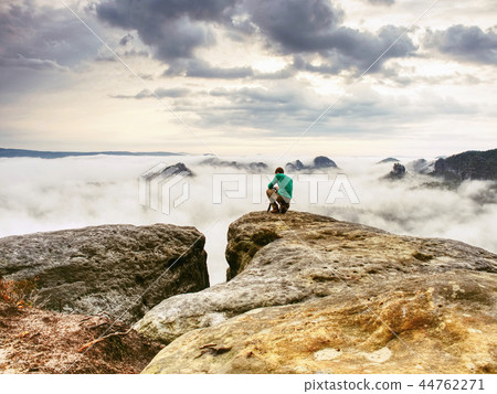 Photographer look to fall landscape through camera 44762271