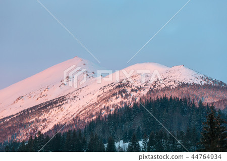 Pink sunrise morning winter mountain view 44764934