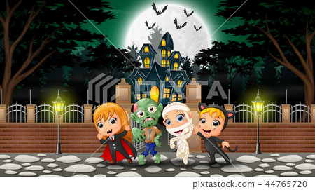 Happy kids wearing halloween costume outdoors with Happy kids wearing halloween costume outdoors with 44765720