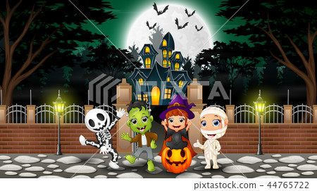 Happy kids wearing halloween costume outdoors with Happy kids wearing halloween costume outdoors with 44765722