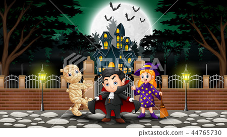 Happy kids wearing halloween costume outdoors with Happy kids wearing halloween costume outdoors with 44765730
