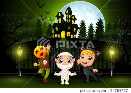 Happy halloween kids outdoors with haunted house b Happy halloween kids outdoors with haunted house b 44765767