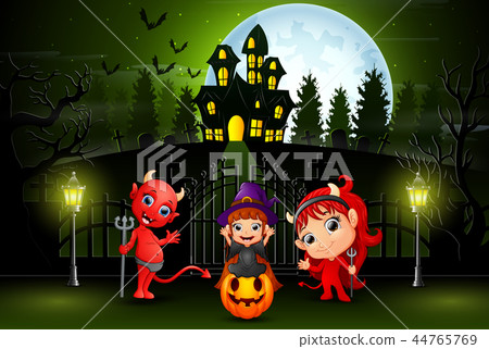 Happy halloween kids outdoors with haunted house b Happy halloween kids outdoors with haunted house b 44765769