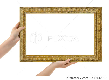 Wooden picture frame in hands Wooden picture frame in hands 44766538