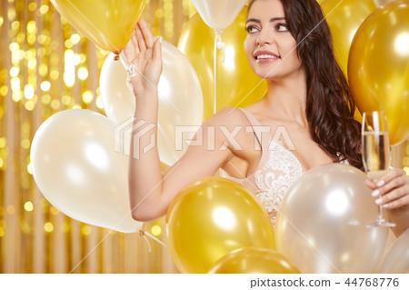 Woman in evening dress with champagne glasses - new year, celebr 44768776