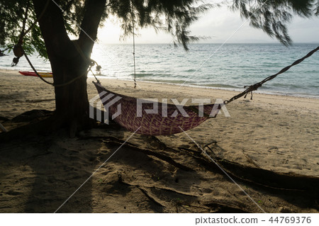 Swing bed on sand beach in afternoon 44769376