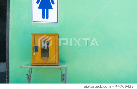 Donate box at front of toilet room Donate box at front of toilet room 44769422