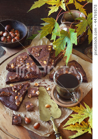 Autumn coffee. Kladdkaka, Swedish chocolate cake Autumn coffee. Kladdkaka, Swedish chocolate cake 44769878