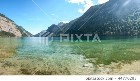 Stunning deep green waters of Konigssee, known as Germany deepest and cleanest lake Stunning deep green waters of Konigssee, known as Germany deepest and cleanest lake 44770295