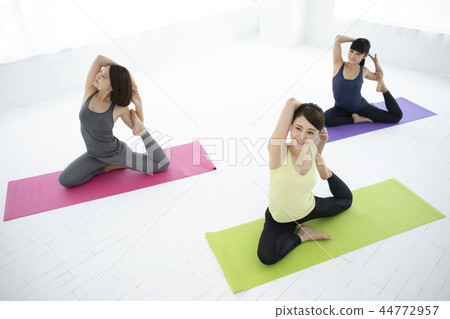 Yoga lesson, dove pose Yoga lesson, dove pose 44772957