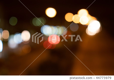 Blurry of bokeh background. Dark space on black. 44773979