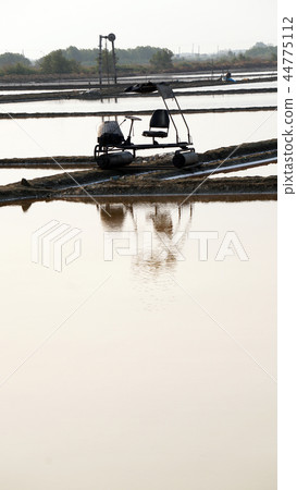 Machine at flower of sea salt in pan field farm 44775112