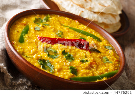 Punjabi recipe Dal Tadka vegetarian yellow lentils Punjabi recipe Dal Tadka vegetarian yellow lentils 44776291
