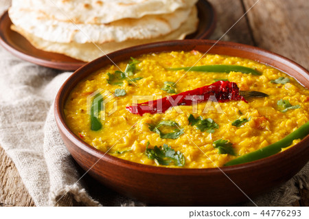 Spicy Indian thick soup Dal Tadka Spicy Indian thick soup Dal Tadka 44776293