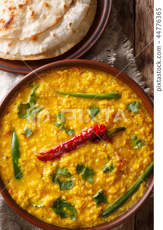 Lentil soup Dal Tadka with naan bread Lentil soup Dal Tadka with naan bread 44776365