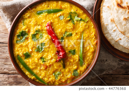 Lentil soup Dal Tadka with naan bread Lentil soup Dal Tadka with naan bread 44776368