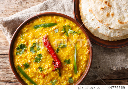 Spicy Indian thick soup Dal Tadka Spicy Indian thick soup Dal Tadka 44776369