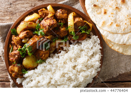 Spicy Indian chicken Do Pyaaza with onions Spicy Indian chicken Do Pyaaza with onions 44776404