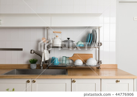 Image of dishwasher with kitchen utensils, kitchen with white background 44776906