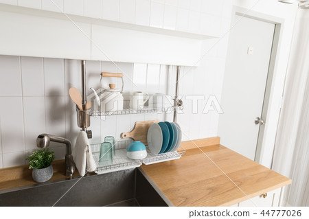 Image of dishwasher with kitchen utensils, kitchen with white background 44777026