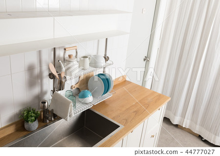 Image of dishwasher with kitchen utensils, kitchen with white background 44777027