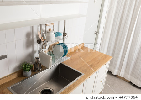 Image of dishwasher with kitchen utensils, kitchen with white background 44777064
