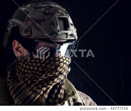 Macro portrait of a handsome military man Macro portrait of a handsome military man 44777339