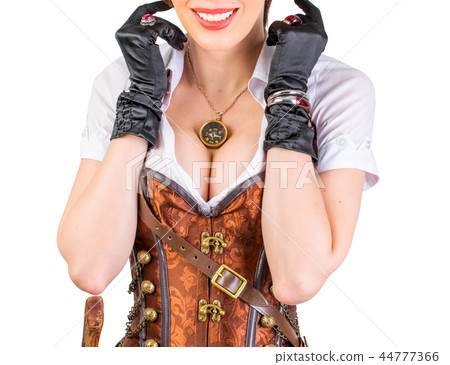 steampunk woman wearing vintage corset and goggles 44777366
