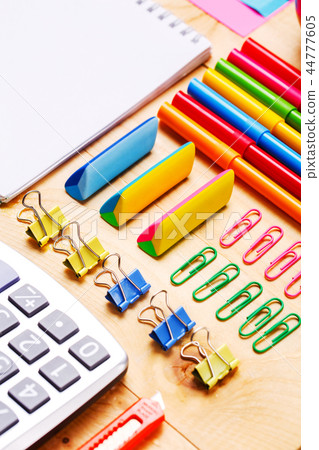 The office stationery is laid out on the secretary table 44777605