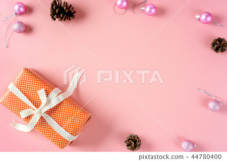 Top view of pink Christmas gift and decorations Top view of pink Christmas gift and decorations 44780400