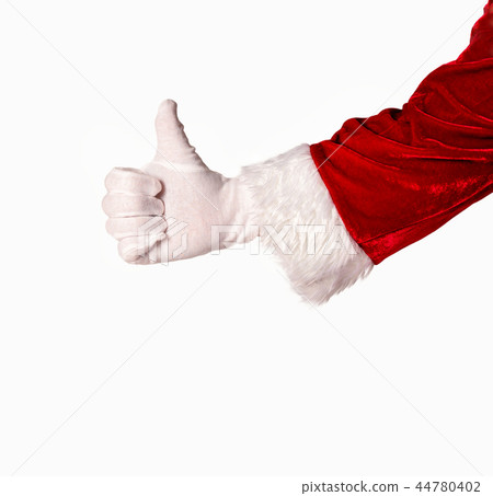 Close up of Santa's hand holding thumb up Close up of Santa's hand holding thumb up 44780402