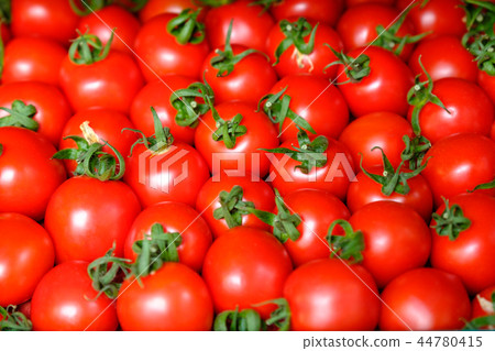 Fresh red tomato abstract fruit colorful pattern texture background. Shallow depth of field. Fresh red tomato abstract fruit colorful pattern texture background. Shallow depth of field. 44780415