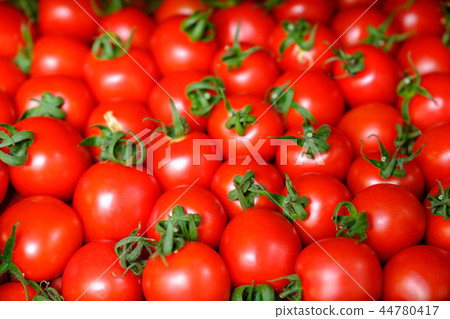 Fresh red tomato abstract fruit colorful pattern texture background. Shallow depth of field. 44780417