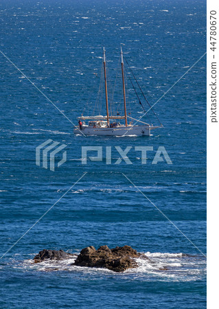 Nice sailboat on the Spanish ocean in Costa Brava Nice sailboat on the Spanish ocean in Costa Brava 44780670